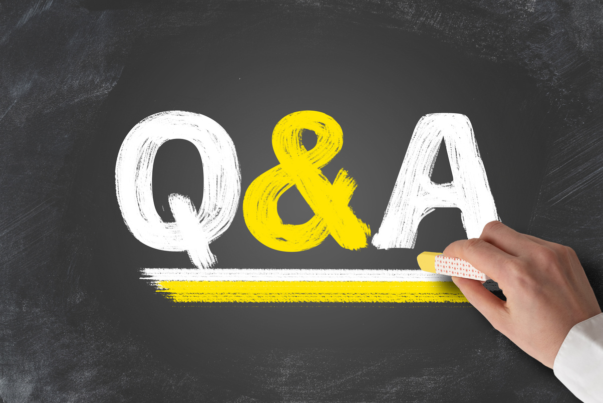 term Q&A, questions and answers, written on chalkboard